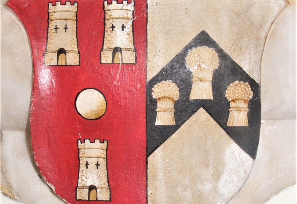 Shield with arms of Howell impaling Cradock