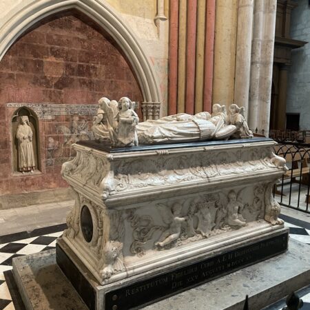 Ornate tomb chest with effigies of 2 young children supported by angels