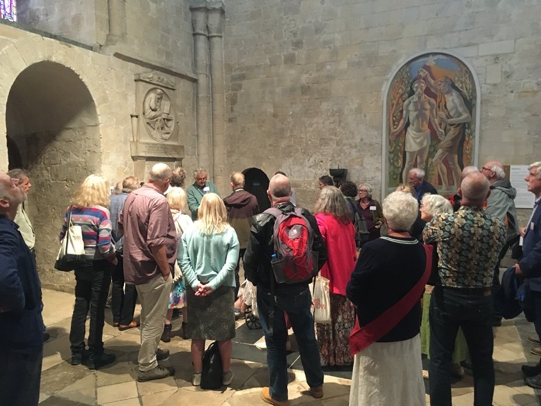 Group looking at a tomb