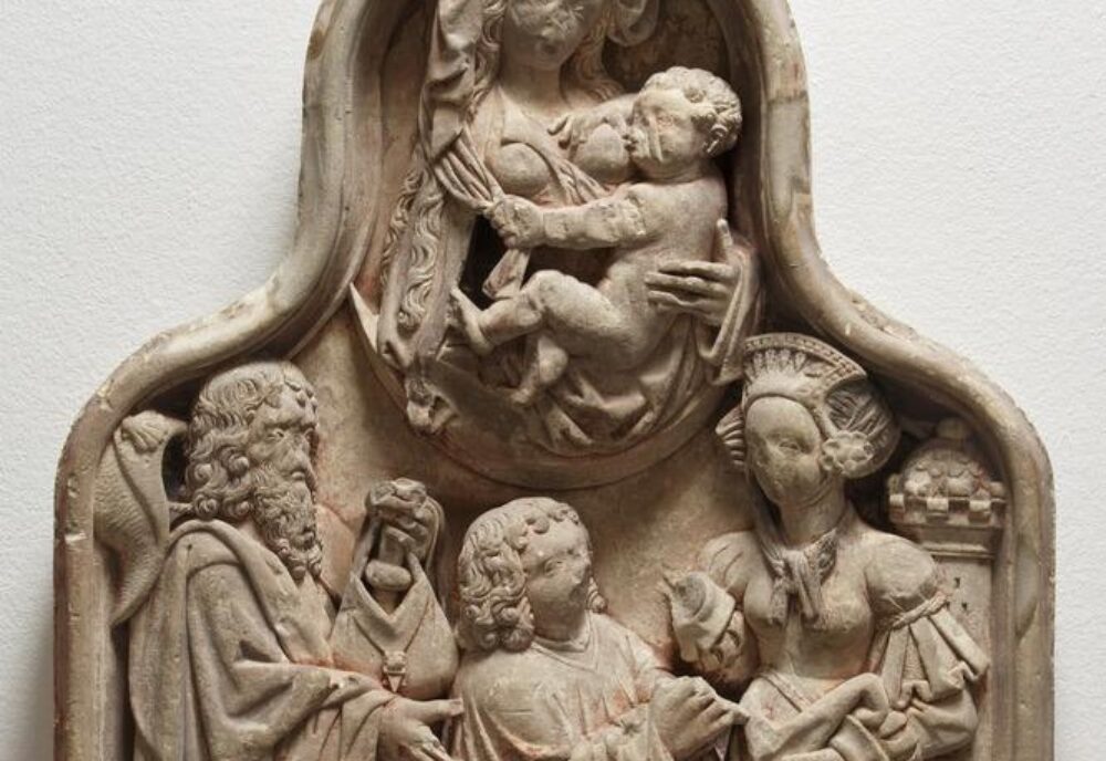 Wall monument showing a canon being presented to the Virgin and Child by Saints James and Barbara