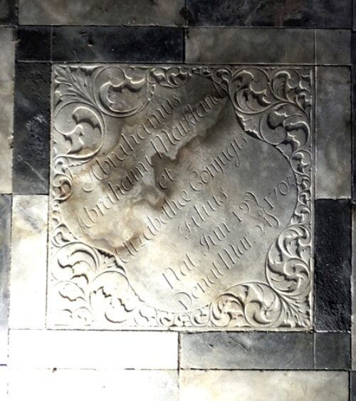 Plaque recording the burial of Abraham Markland, d.1706