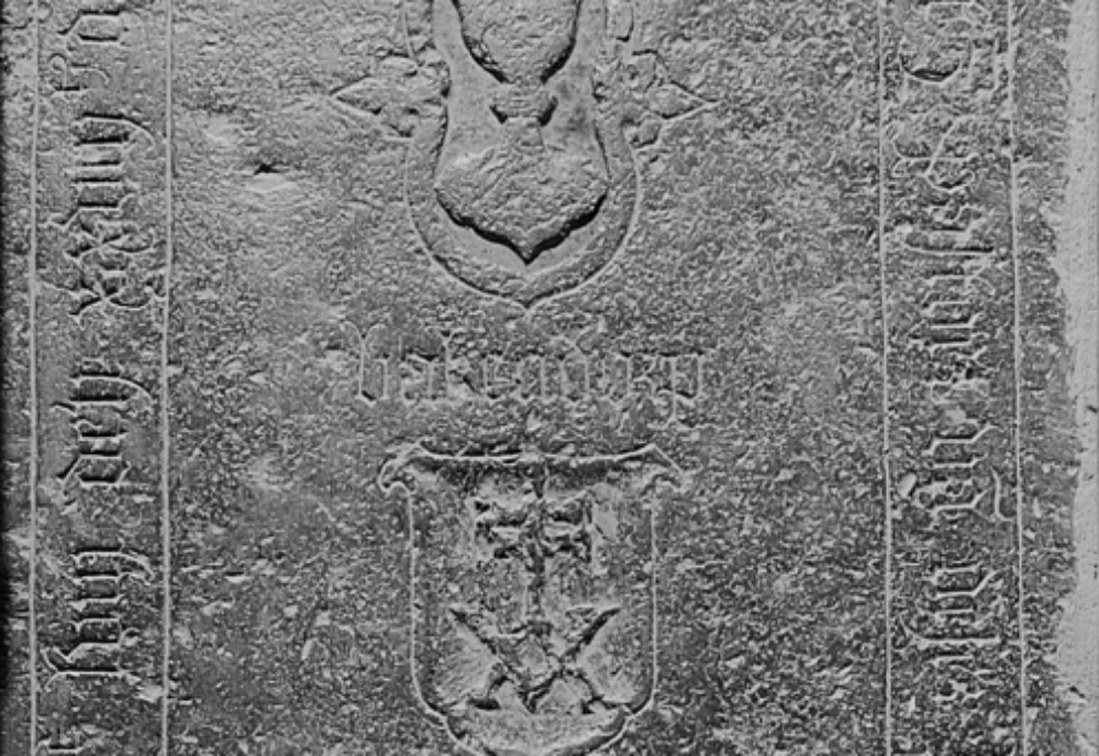 Ledgerstone with chalice, host and shield in centre. Details in text of article.