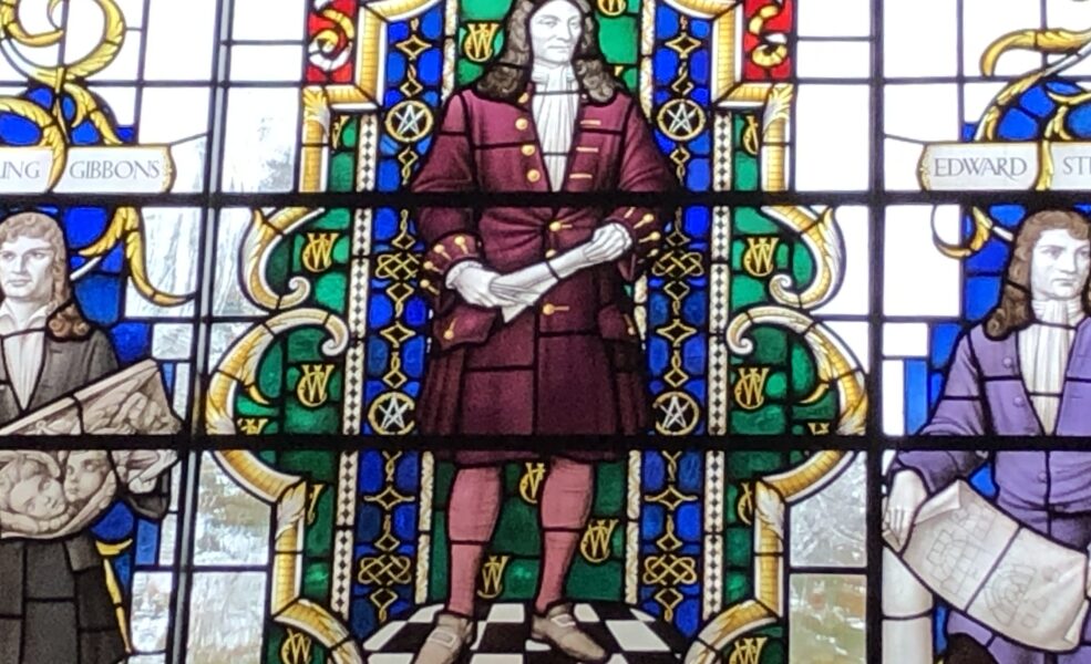 Stained glass window depicting Sir Christopher Wren holding rolled-up plans Stained glass window depicting Sir Christopher Wren holding rolled-up plans