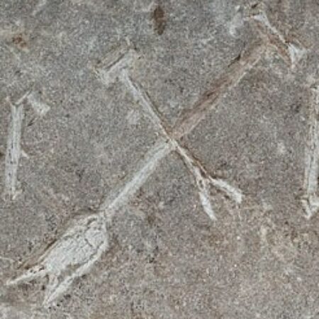 Fig 4 detail tomb slab showing spade and rake
