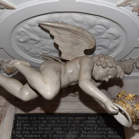 Fig 3 An angel holds out a crown and points heavenwards resized