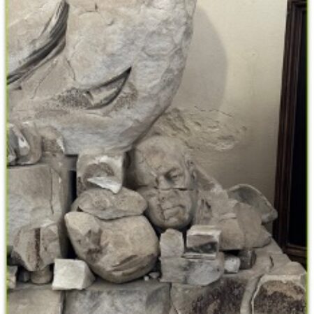 Head and other fragments from ruined monument
